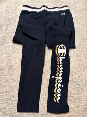 Women’s Champion Black Leggings with Gold & White Script (size S)